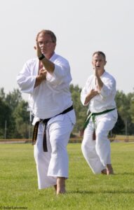 Sensei Steve Hatle leads Sempai David Huyck in a Pinan kata